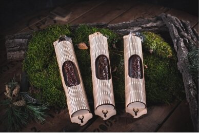 Venison sausage in wooden packaging